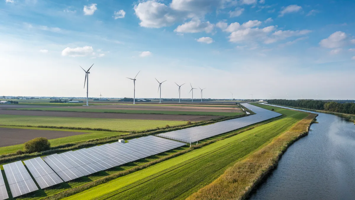 Solar panels and wind turbines generating renewable energy for green and sustainable future.